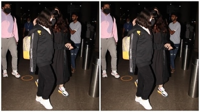 Aishwarya styled the all-black outfit with minimal accessories, keeping in mind the comfort factor to complete her flight journey. She left her long locks open in a centre parting and chose a diamond emerald ring and multi-coloured white sneakers with lace-up front to round it all off. (HT Photo/Varinder Chawla) Aishwarya styled the all-black outfit with minimal accessories, keeping in mind the comfort factor to complete her flight journey. She left her long locks open in a centre parting and chose a diamond emerald ring and multi-coloured white sneakers with lace-up front to round it all off. (HT Photo/Varinder Chawla)