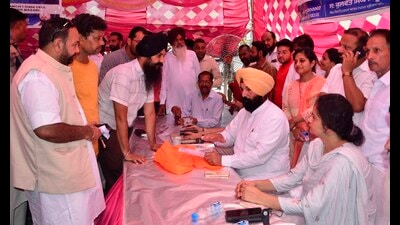 Atam Nagar MLA Kulwant Singh Sidhu during the public meeting held outside Ludhiana MC’s Zone-C office on Gill Road on Tuesday. (Harvinder Singh/HT) Atam Nagar MLA Kulwant Singh Sidhu during the public meeting held outside Ludhiana MC’s Zone-C office on Gill Road on Tuesday. (Harvinder Singh/HT)
