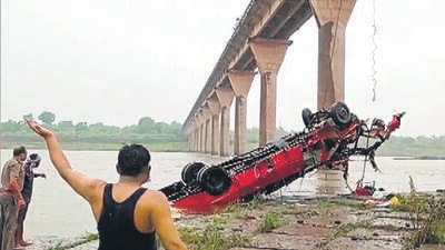 Rescue operation underway after MSRTC bus going from Indore to Pune falls off Khalghat Sanjay Setu, in Dhar on Monday. After the accident, Pune MSRTC division has sent strict guidelines to its staff on safe driving. (ANI)