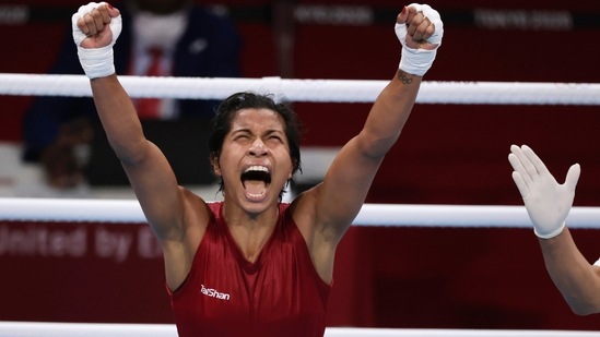 Lovlina Borgohain celebrates after the fight against Chen Nien-Chin of Taiwan at Tokyo Games.(Reuters)