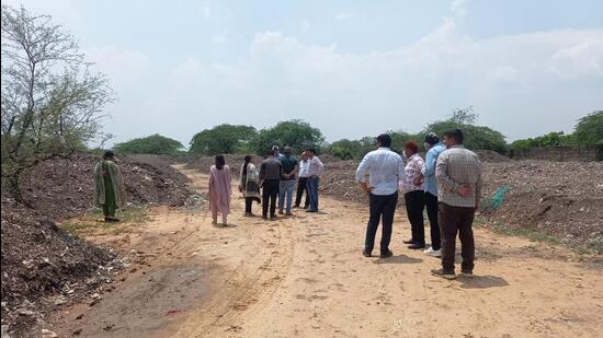 Officials inspecting Aravallis near the Bandhwari landfill on Monday. (Sourced) Officials inspecting Aravallis near the Bandhwari landfill on Monday. (Sourced)