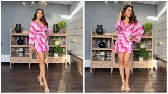 Nushrratt Bharuccha set major summer fashion goals with her uber trendy look in a multi-coloured playsuit which she teamed with white pointed stilettoes.(Instagram/@nidhijeswani)