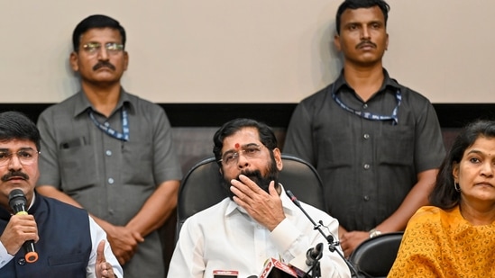 Shiv Sena MP Rahul Shewale speaks as Maharashtra CM Eknath Shinde and party MP Bhavana Gawali look on during a press meet in New Delhi on Tuesday.(PTI)