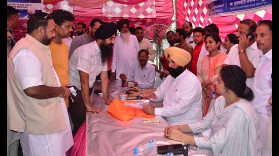 Atam Nagar MLA Kulwant Singh Sidhu during the public meeting held outside Ludhiana MC’s Zone-C office on Gill Road on Tuesday. (Harvinder Singh/HT)