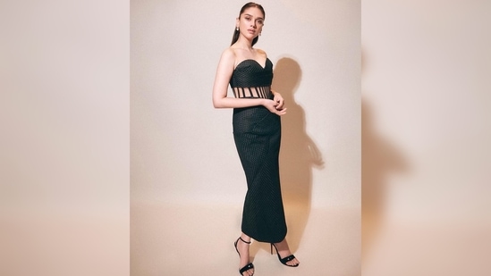 Aditi Rao Hydari elevated her look by teaming her look with a pair of black open-toe stilettoes.(Instagram/@stylebyami)