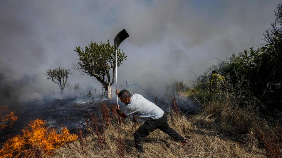 The average maximum for first 18 days of July in Europe is 25.24 degrees, which is 2.11 degrees warmer than normal for this period. (AP Photo)