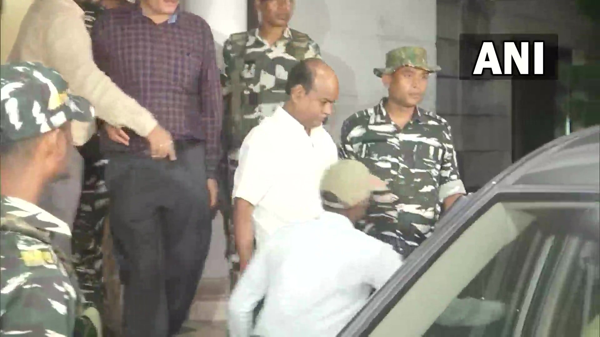 Pankaj Mishra is being taken by the ED after his arrest in Ranchi. (ANI Twitter) Pankaj Mishra is being taken by the ED after his arrest in Ranchi. (ANI Twitter) 