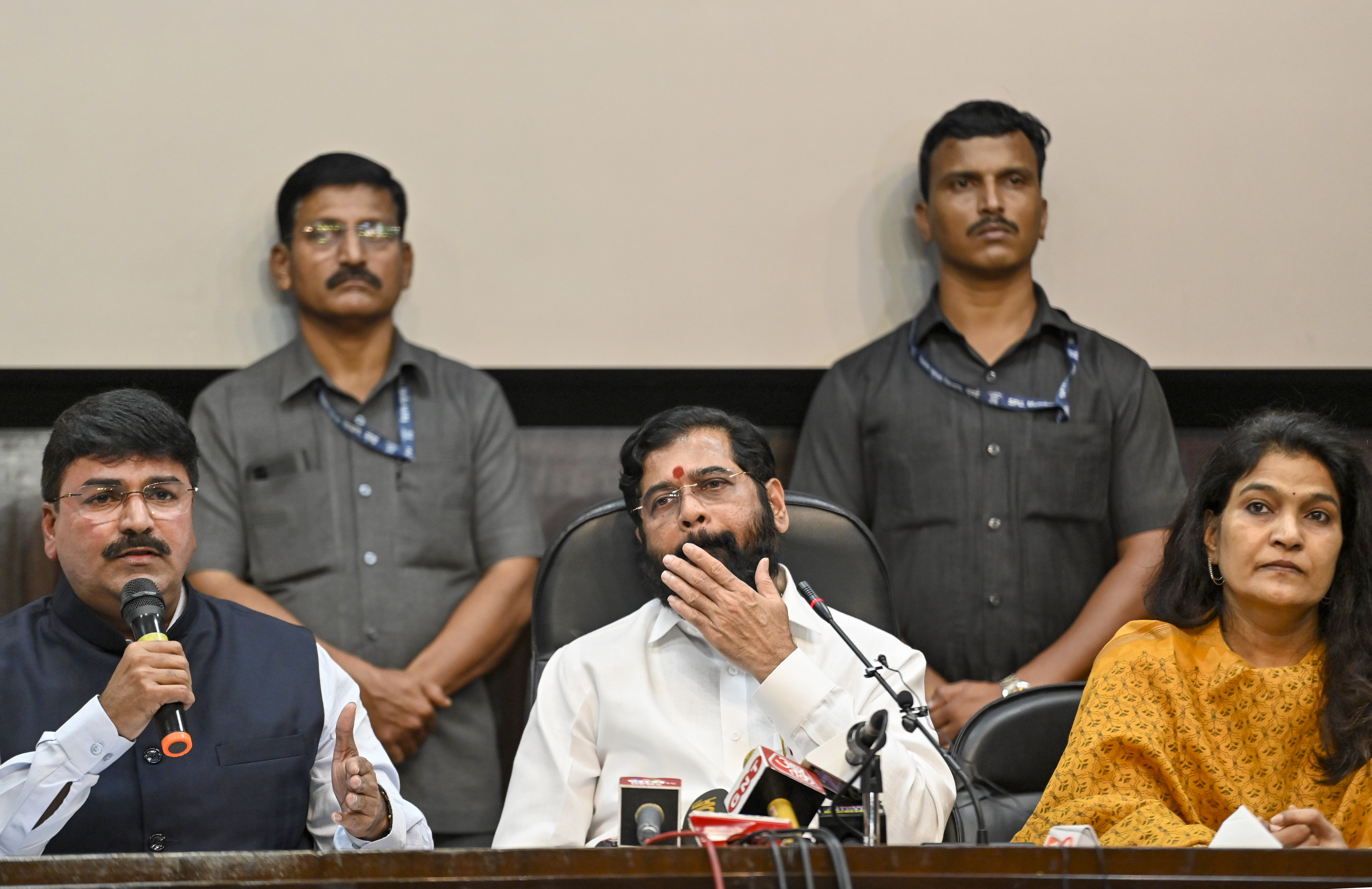 Shiv Sena MP Rahul Shewale speaks as Maharashtra CM Eknath Shinde and party MP Bhavana Gawali look on during a press meet in New Delhi on Tuesday. (PTI)