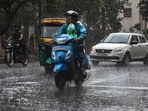 New Delhi: Vehicles ply on a road during monsoon rain in New Delhi, Wednesday. New Delhi: Vehicles ply on a road during monsoon rain in New Delhi, Wednesday.