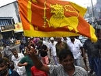 Supporters of newly elected Sri Lankan President Ranil Wikeramasinghe celebrate in Colombo.