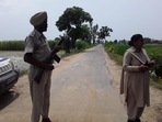 Police personnel at encounter site in Amritsar, Punjab. Police personnel at encounter site in Amritsar, Punjab.