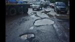 Potholes in Majiwada, Thane. Traffic snarls in the city are largely due to potholes, increasing the time spent by the commuters on the road, especially during the monsoon. (PRAFUL GANGURDE/HT PHOTO) Potholes in Majiwada, Thane. Traffic snarls in the city are largely due to potholes, increasing the time spent by the commuters on the road, especially during the monsoon. (PRAFUL GANGURDE/HT PHOTO)