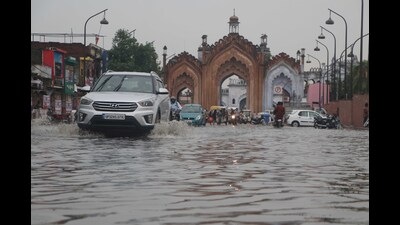 Water logging after a heavy rainfall at Old city in Lucknow on Wednesday. (HT Photo)