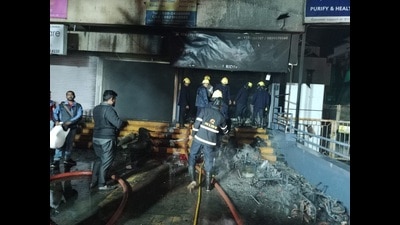 Seven electric two wheelers were gutted in a blaze in a showroom near Gangadham in Market Yard area on Monday evening. (HT PHOTO) Seven electric two wheelers were gutted in a blaze in a showroom near Gangadham in Market Yard area on Monday evening. (HT PHOTO)