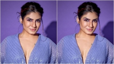 Raveena’s ankle-length gown also came with a gathered detail at the waist. In silver stilettos from Sana K Luxurious Footwear, Raveena perfectly completed the look. (Instagram/@officialraveenatandon)