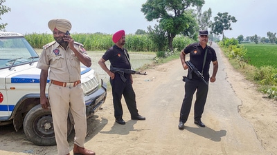Amritsar: Punjab Police personnel during an encounter with gangsters suspected to be involved in the Sidhu Moose Wala murder case near Attari in Amritsar, Wednesday, July 20, 2022. (PTI Photo) Amritsar: Punjab Police personnel during an encounter with gangsters suspected to be involved in the Sidhu Moose Wala murder case near Attari in Amritsar, Wednesday, July 20, 2022. (PTI Photo) 