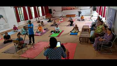 Participants on Day 3 of the integrated yoga and ayurveda wellness camp being organised at Government College of Yoga Education and Health in Chandigarh on Wednesday. (HT Photo)