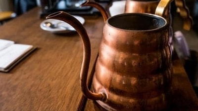 Helps with digestion: Copper water removes pollutants and harmful germs, reduces stomach irritation, and boosts metabolism, aiding digestion. (Unsplash) Helps with digestion: Copper water removes pollutants and harmful germs, reduces stomach irritation, and boosts metabolism, aiding digestion. (Unsplash)