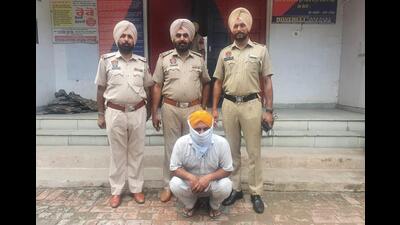 The accused has been identified as Baljeet Singh, 45, is posted as gunman of former Payal MLA Lakhvir Singh Lakha. (HT Photo)