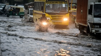 Vehicles wade through waterlogged stretch in Delhi, India, on Wednesday, July 20, 2022. (Photo by Raj K Raj/Hindustan Times) 