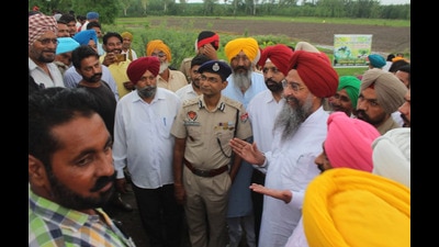 Punjab Vidhan Sabha speaker Kultar Singh Sandhwan speaking to locals during the inspection on Wednesday. (HT Photo)