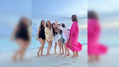 Katrina Kaif kept her look simple and wore a black swimsuit teamed with an oversized white shirt. (Instagram/@katrinakaif) Katrina Kaif kept her look simple and wore a black swimsuit teamed with an oversized white shirt. (Instagram/@katrinakaif)