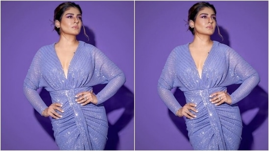 Styled by fashion stylist Surina Kakkar, Raveena wore her tresses into a messy bun with a few strands of hair left open, and a middle part.(Instagram/@officialraveenatandon)