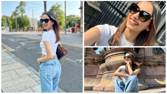 Former Miss World and Samrat Prithviraj actor Manushi Chhillar took over the streets of Edinburg, the United Kingdom with her uber casual yet trendy avatar in a basic white crop top, loose-fit ripped denim and black sneakers.(Instagram/@manushi_chhillar)