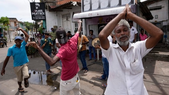 Revellers gathered to celebrate after Wickremesinghe was chosen president in Colombo.(AP)