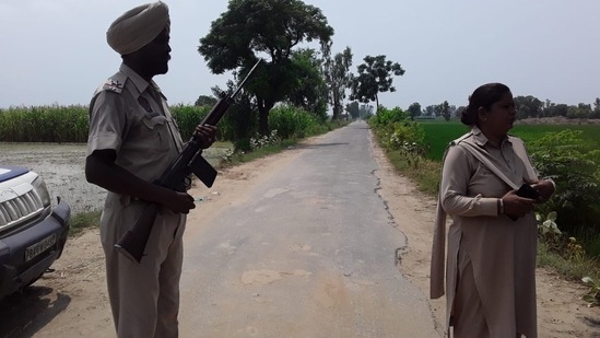 Police personnel at encounter site in Amritsar, Punjab.