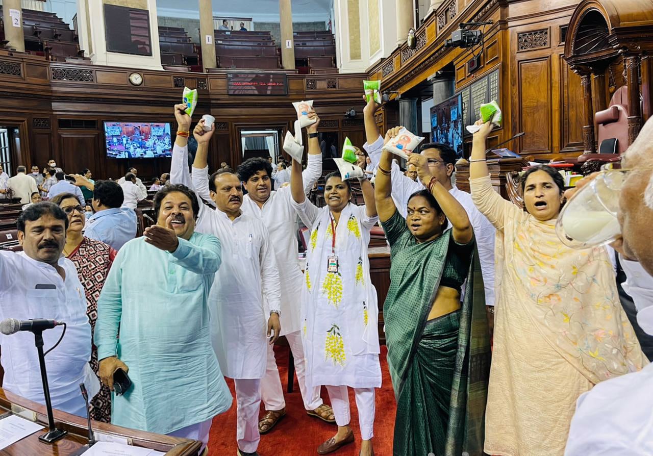 Opposition MPs sloganeering in the Well of Rajya Sabha during a Monsoon Session of Parliament. (ANI) Opposition MPs sloganeering in the Well of Rajya Sabha during a Monsoon Session of Parliament. (ANI)