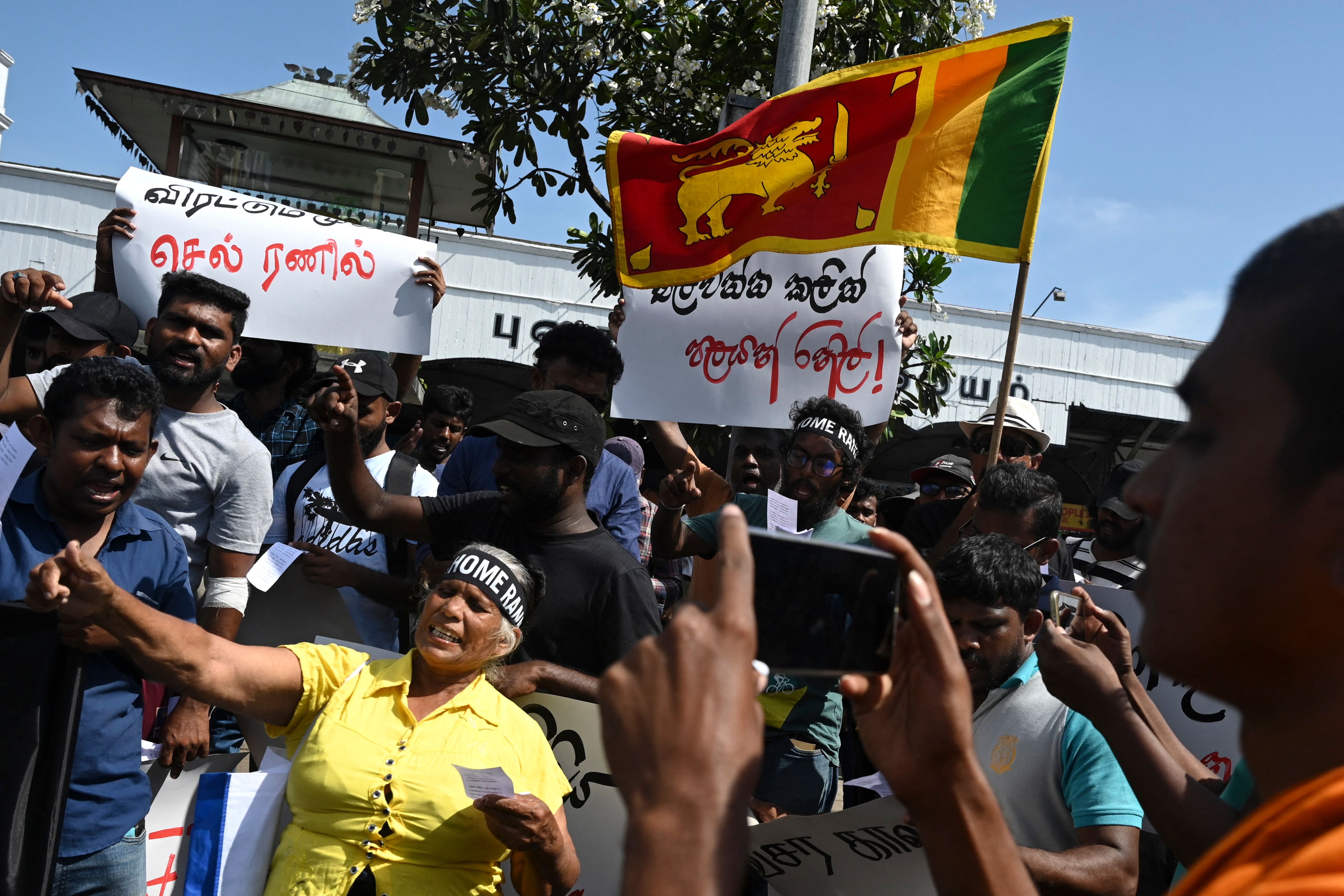 Demonstrators shout slogans against interim Sri Lankan President Ranil Wickremesinghe during a protest in front of the Fort railway station in Colombo. (Photo by Arun SANKAR/AFP) (AFP) Demonstrators shout slogans against interim Sri Lankan President Ranil Wickremesinghe during a protest in front of the Fort railway station in Colombo. (Photo by Arun SANKAR/AFP) (AFP)