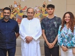Odisha CM Naveen Patnaik meets R Madhavan, his wife Sarita Birje and son Vedaant Madhavan.