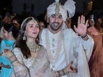 Alia Bhatt and Ranbir Kapoor pose for paparazzi after their wedding in April. Alia Bhatt and Ranbir Kapoor pose for paparazzi after their wedding in April.