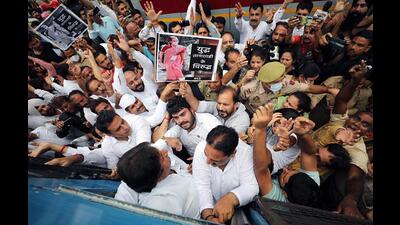 Jammu and Kashmir Congress leaders being detained by Police personnel during a protest over the summoning of party Interim President Sonia Gandhi by Enforcement Directorate (ED) for questioning in the National Herald case, in Jammu on Thursday. (Shanky Rathore)
