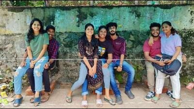 After a bus stop bench in Thiruvananthapuram was reduced to three separate seats as an alleged moral policing measure, students of both sexes from an engineering college sat on each other’s laps and posted pictures of the same online. (HT Photo)