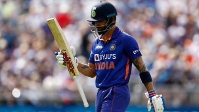 India's Virat Kohli walks after being caught out by England's Jos Buttler off the bowling of Reece Topley (Action Images via Reuters)