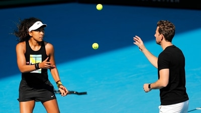 FILE - Japan's Naomi Osaka warms-up with her coach Wim Fissette (AP) FILE - Japan's Naomi Osaka warms-up with her coach Wim Fissette (AP)