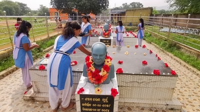 Notably, the celebrations began at SLS (Shyam, Laxman & Sipun) Memorial Residential School, Pahadpur, Odisham founded by Murmu in memory of her husband and 2 sons after their demise. (PTI) Notably, the celebrations began at SLS (Shyam, Laxman & Sipun) Memorial Residential School, Pahadpur, Odisham founded by Murmu in memory of her husband and 2 sons after their demise. (PTI)