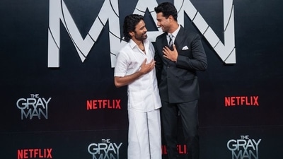 Dhanush and Vicky Kaushal posed for pictures at The Gray Man premiere's red carpet. Vicky also shared the pictures on his Instagram handle and commended Dhanush by saying, “More power to you.” Dhanush and Vicky Kaushal posed for pictures at The Gray Man premiere's red carpet. Vicky also shared the pictures on his Instagram handle and commended Dhanush by saying, “More power to you.” 