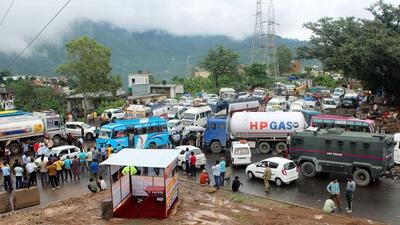 Jammu-Srinagar National Highway closed for vehicular traffic due to a landslide, in Udhampur on Thursday. (ANI)
