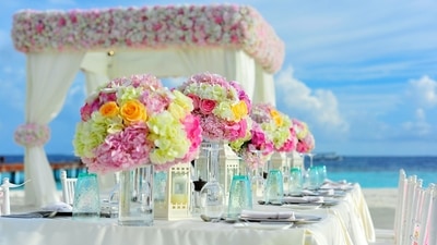 4. Choosing a venue - The next major decision in the process is to choose the right wedding venue as per the selected date and time. The right venue can add the right mood to your wedding and ensure you get the perfect wedding pictures to drool over. With a high budget, you could host a luxurious wedding in 5-star hotels and heritage properties across the country. Whether it’s an in-town wedding or a destination wedding, with a high budget you could host a royal affair on a huge ground in your city or at a popular property for a destination wedding. Even with a low budget, you can have your guests enthralled with picturesque locations at your personalised locations. These could be your own backyard, an ancestral home, a friend’s farmhouse, or a family garden. Such locations add more to the emotions involved and help in allocating your budget to other important vendors like the decor, photography, etc. (Asad Photo Maldives) 4. Choosing a venue - The next major decision in the process is to choose the right wedding venue as per the selected date and time. The right venue can add the right mood to your wedding and ensure you get the perfect wedding pictures to drool over. With a high budget, you could host a luxurious wedding in 5-star hotels and heritage properties across the country. Whether it’s an in-town wedding or a destination wedding, with a high budget you could host a royal affair on a huge ground in your city or at a popular property for a destination wedding. Even with a low budget, you can have your guests enthralled with picturesque locations at your personalised locations. These could be your own backyard, an ancestral home, a friend’s farmhouse, or a family garden. Such locations add more to the emotions involved and help in allocating your budget to other important vendors like the decor, photography, etc. (Asad Photo Maldives)