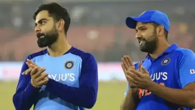 Virat Kohli (L) with Rohit Sharma