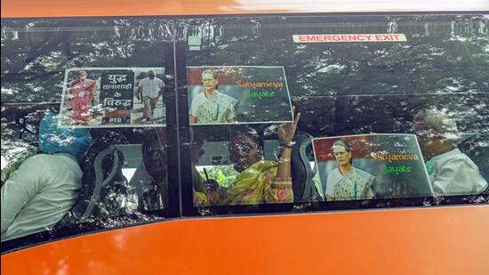 Congress leaders going to party Headquarters from Parliament by bus during a protest against the questioning of interim president Sonia Gandhi by the Enforcement Directorate on Thursday. (ANI Photo)