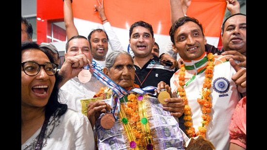 Para athlete Vikas Dagar (second from right) has been coaching his grandmother Bhagwani Devi Dagar (centre) in her journey so far. (Photo: Prateek Kumar/ANI)