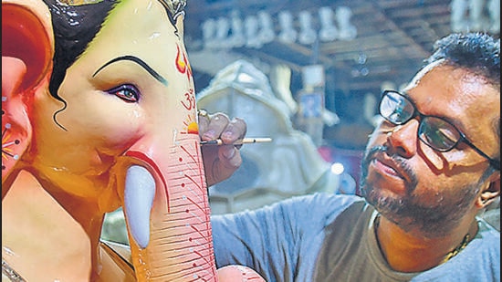 An artist gives finishing touches to an idol of Ganesh in Mumbai PTI An artist gives finishing touches to an idol of Ganesh in Mumbai PTI