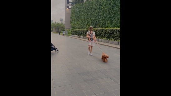 The image, taken from the video, shows Aparshakti Khurana&nbsp;with his daughter and dog. (Instagram/@aparshakti_khurana)