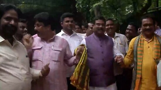 Union minister Dharmendra Pradhan celebrates with folk artists in Delhi. (Screengrab/ANI video)