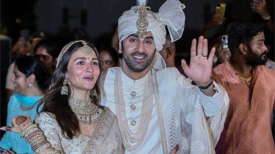 Alia Bhatt and Ranbir Kapoor pose for paparazzi after their wedding in April.&nbsp;