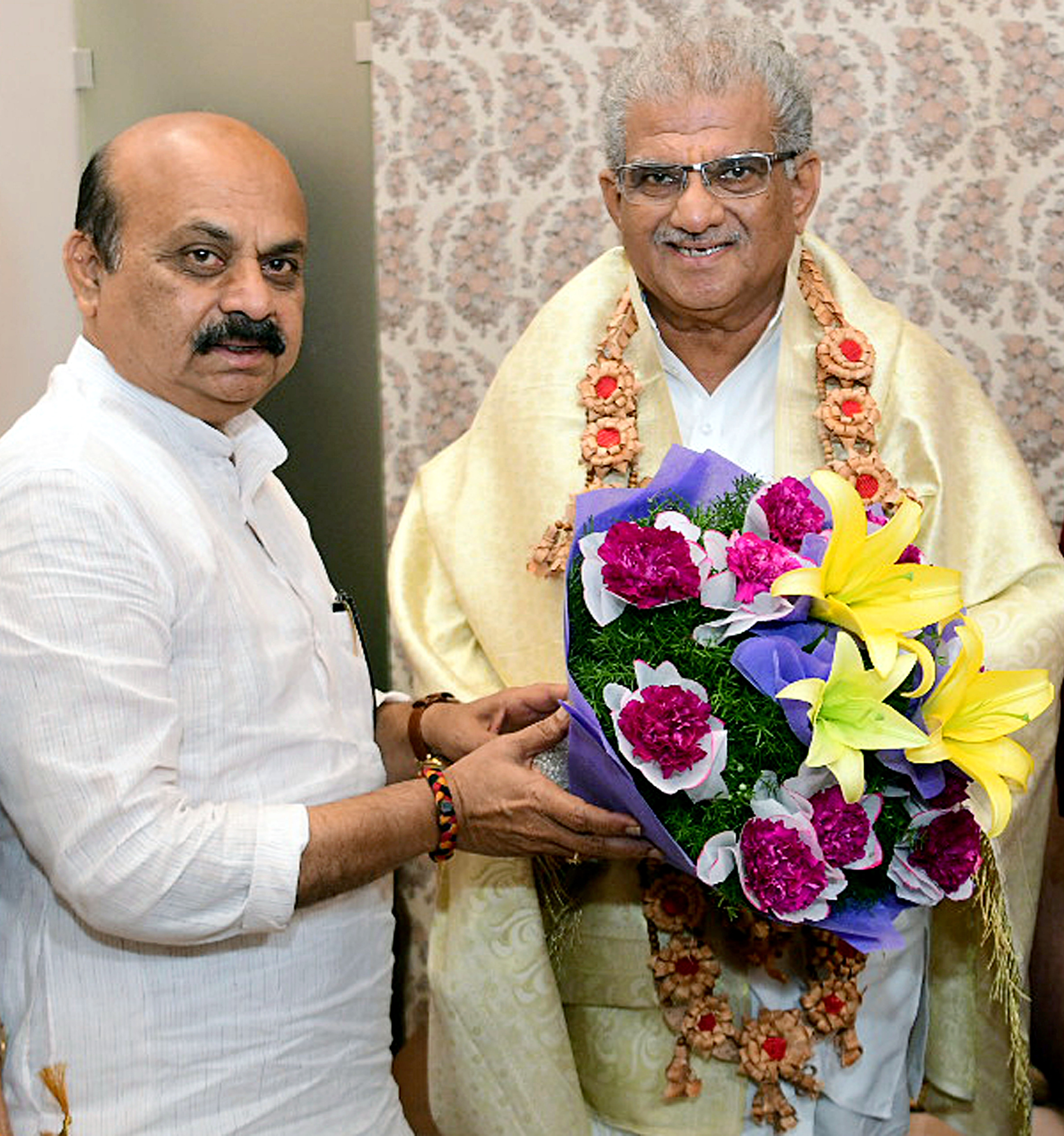 Karnataka Chief Minister Basavaraj Bommai with Veerendra Heggade after he was nominated to Rajya Sabha. (ANI Photo) (Arunkumar Rao)